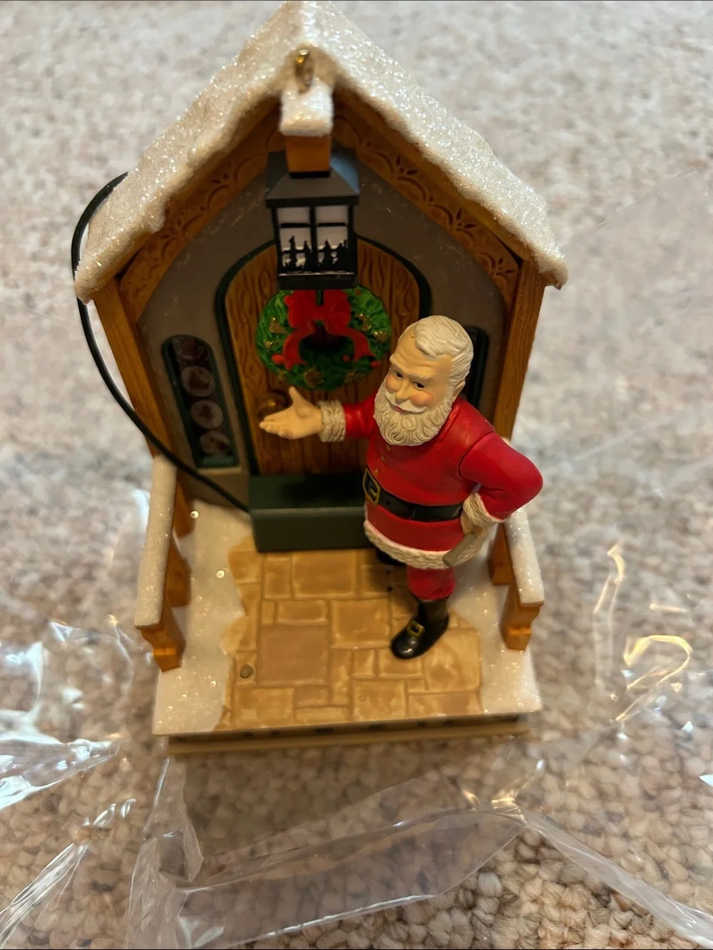 2011 Hallmark Keepsake Ornament - Decking the Door - Santa in Red